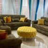 Luxury Sofa Set in Uganda with a center table/yellow coffee table